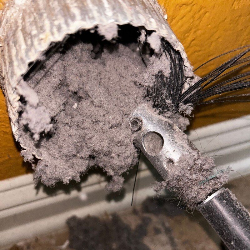 Commercial HVAC duct cleaning technician on-site in Brooklyn